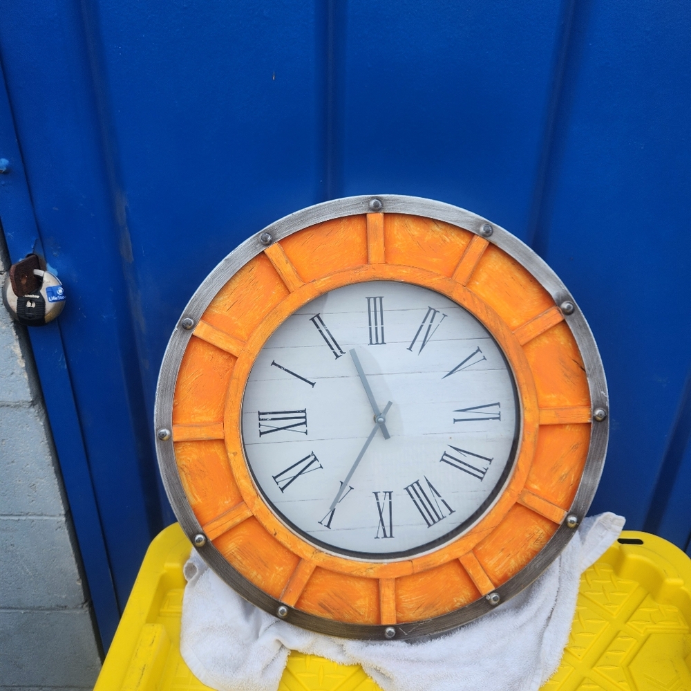 Orange and Silver Wall Clock